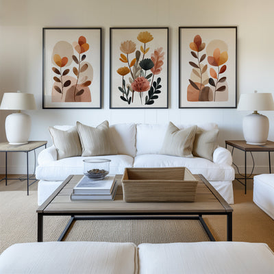 Autumn Botanicals set of 3 prints above a white sofa in a living room