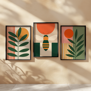 Sun & Stem Set of 3 Prints displayed in a bright room, featuring colourful botanical and geometric wall art