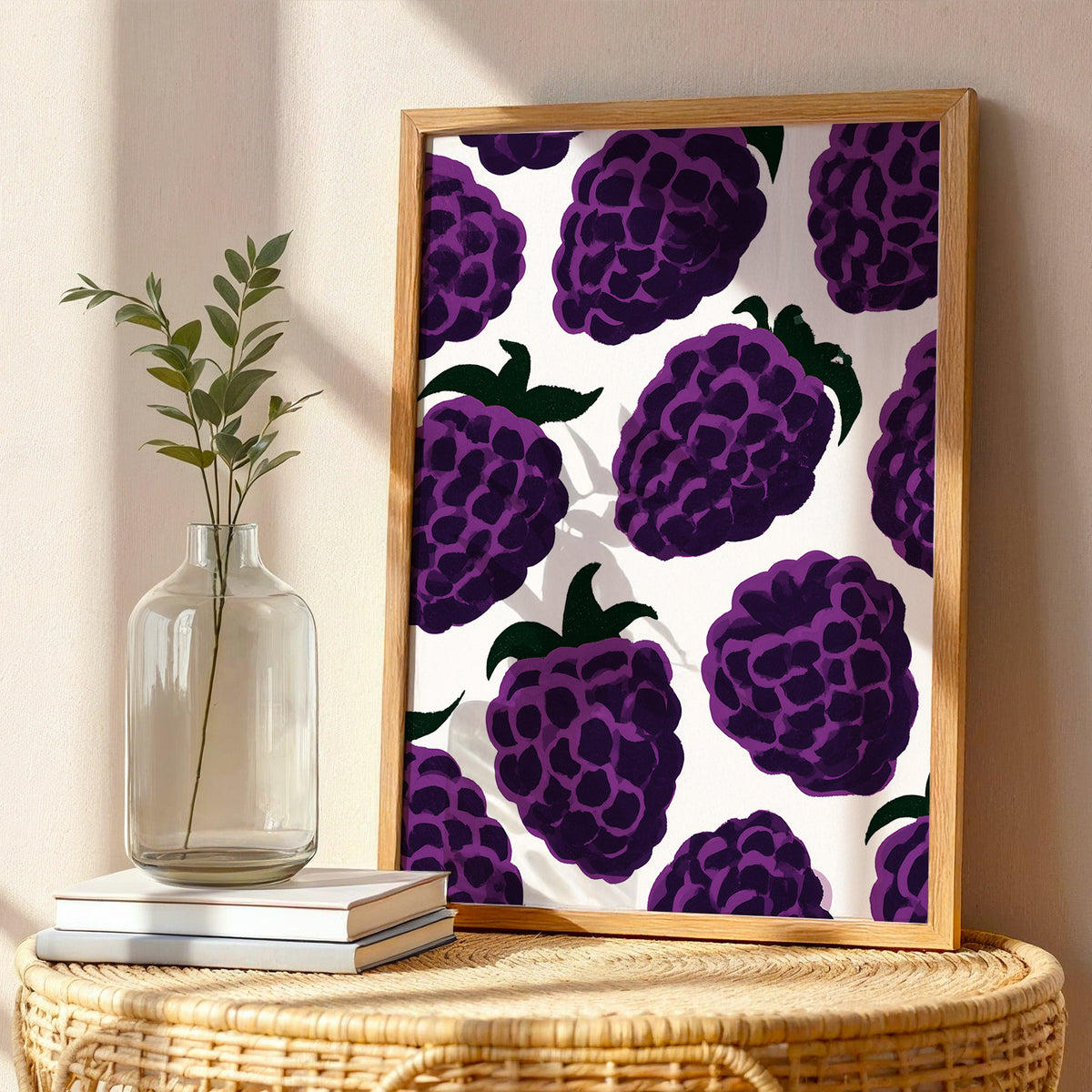 Blackberry wall art print featuring vibrant purple blackberries and green leaves on a warm background.