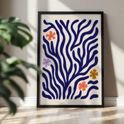 Wildflower Coral botanical print, cobalt branches with small flowers, shown in a room